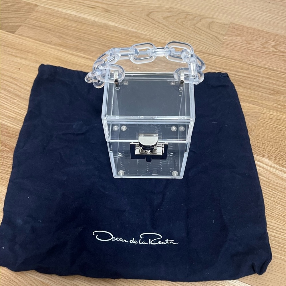 Fabulous Oscar de la Renta clear Acrylic clutch.